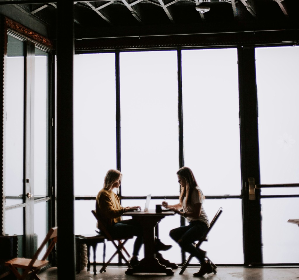 Two Anthea candidates working together at a table